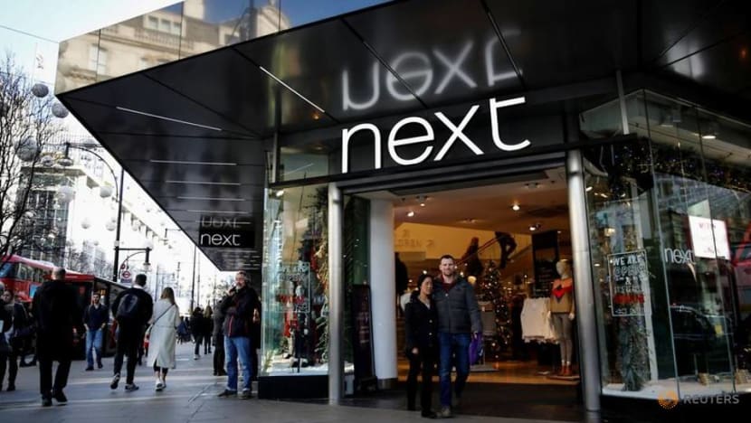 Next's profit halves after pandemic shutters stores Next's profit halves after pandemic shutters stores