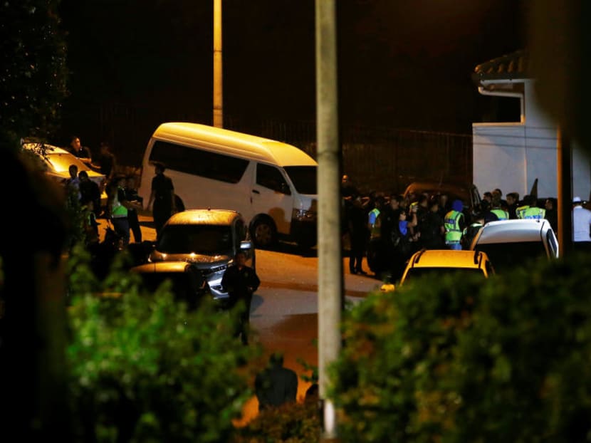 Police arriving at former prime minister Najib Razak's residence in Kuala Lumpur, Malaysia on Wednesday (May 16).