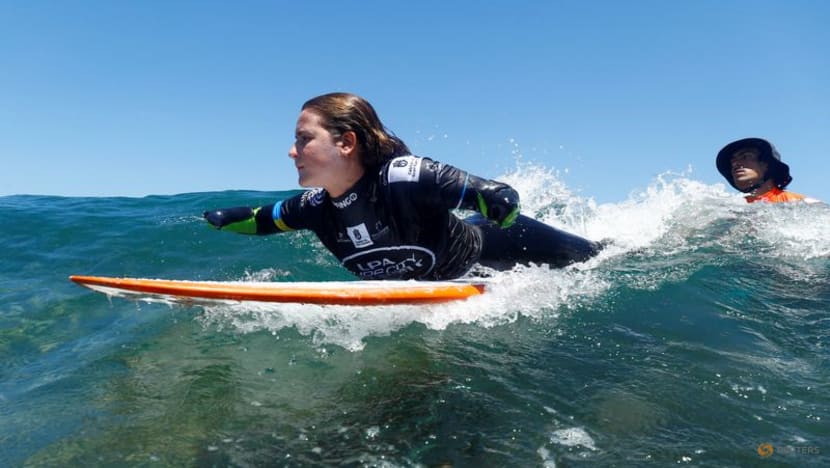 Surfing-Amputee surfer making waves in the sport