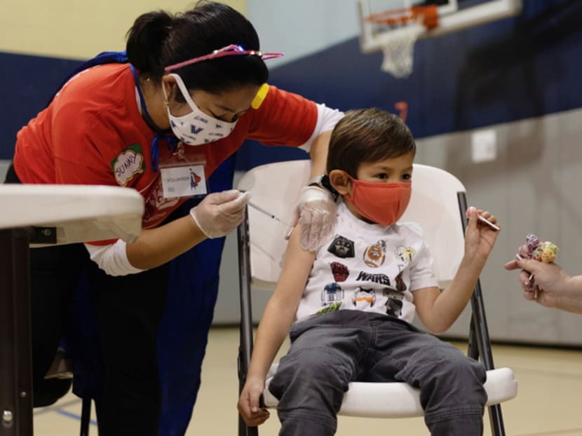 A five-year-old boy receiving the Pfizer-BioNTech Covid-19 vaccine in Pennsylvania on Dec 5, 2021. 