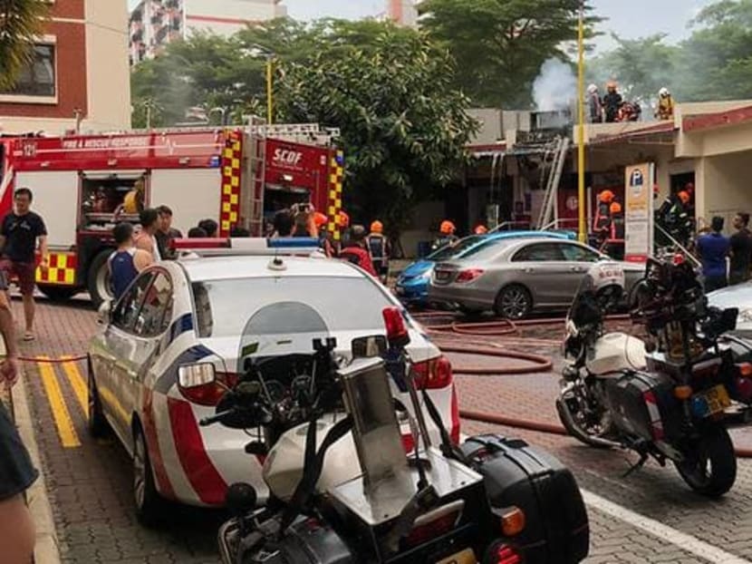SCDF officers and the police were spotted at the scene of the fire.