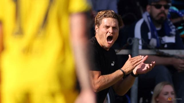 Dortmund need win against Wolfsburg as storm clouds gather