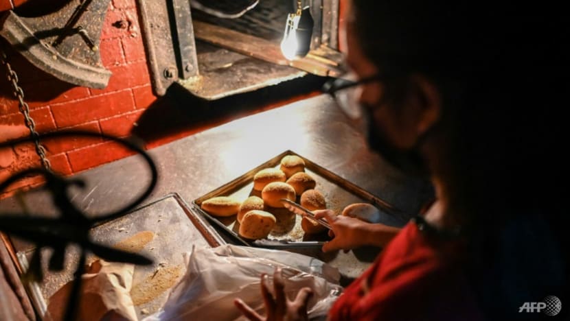 Philippine bakeries shrink 'poor man's bread' as inflation bites Philippine bakeries shrink 'poor man's bread' as inflation bites