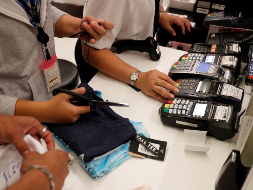 Over half of the respondents said they believe card payments are more secure than paying in cash, while close to half said they have more payment cards in their wallets now, compared to five years ago. Photo: Reuters
