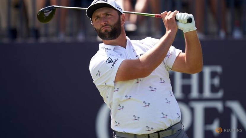 Golf-Rahm hangs tough to stay in contention Golf-Rahm hangs tough to stay in contention