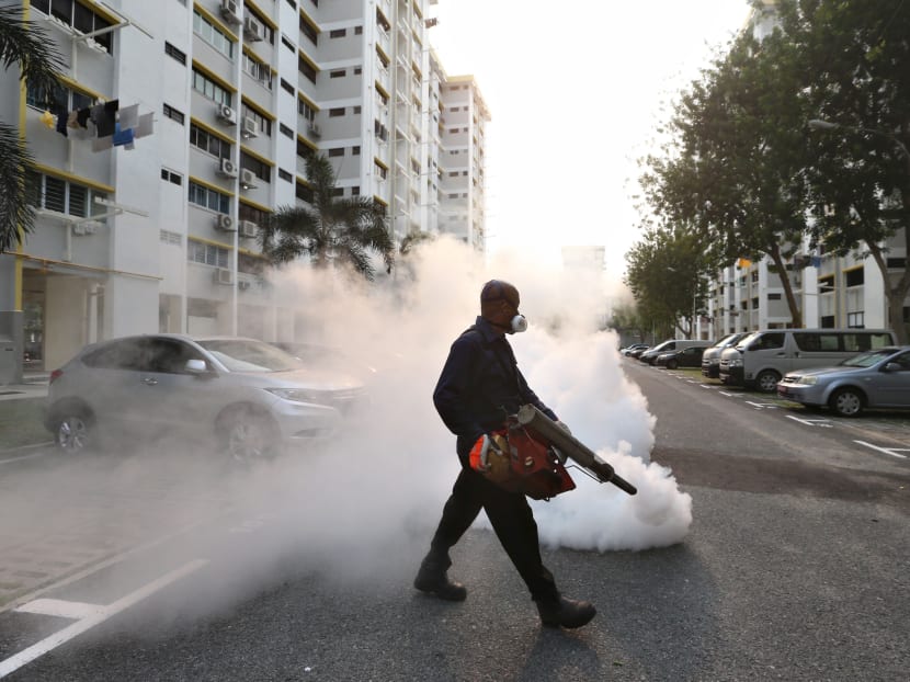 Thermal fogging being carried out in the vicinity of Block 102, Aljunied Crescent on Aug 28. Photo: Ooi Boon Keong