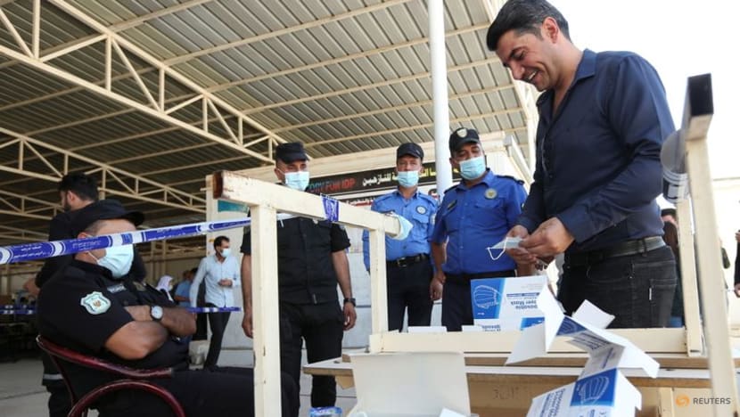 Soldiers, prisoners, displaced people vote early ahead of Iraq election Soldiers, prisoners, displaced people vote early ahead of Iraq election