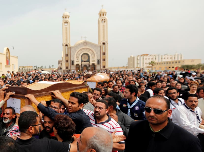 Relatives mourn the victims of the Palm Sunday bombings during the funeral at the Monastery of Saint Mina "Deir Mar Mina" in Alexandria, Egypt. Photo: Reuters