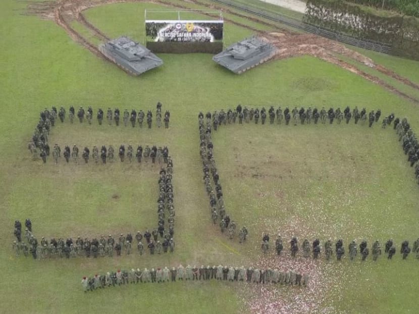 Photo of the day: To mark 50 years of bilateral relations between Singapore and Indonesia, soldiers from the armies of both countries formed the number “50” at the end of Exercise Safkar Indopura on Monday afternoon. The exercise, the 29th in the series, is the flagship exercise between the two armies. Photo: Mindef