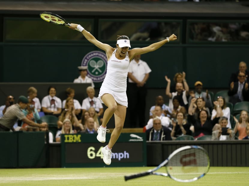 Hingis, 34, teams with Mirza to win Wimbledon doubles title