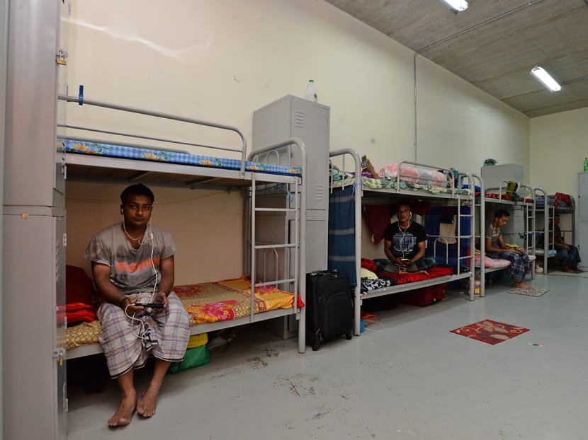 Migrant workers at the factory-converted dormitory operated by ASL Shipyard. Over the past year, the MOM had taken steps to educate operators on basic housing requirements, urging them to meet standards. Photo: Robin Choo