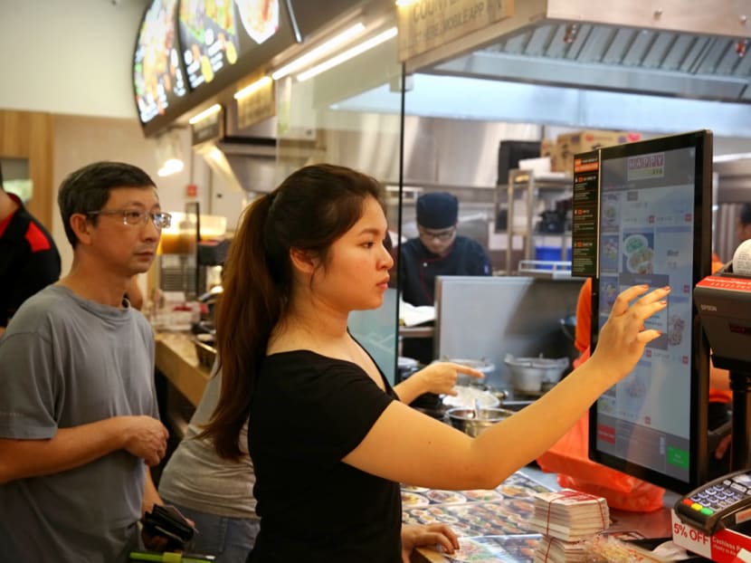 First ‘productive’ coffee shops employ tray-return, floor-cleaning robots