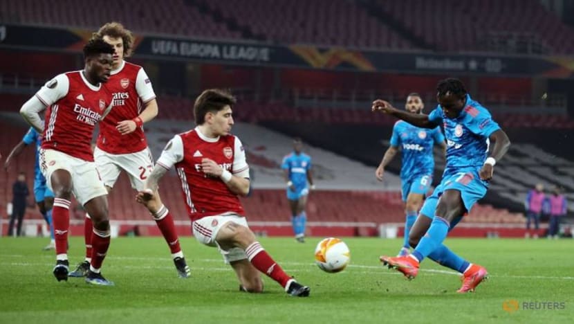 Football: Arsenal reach last eight despite defeat by Olympiakos Football: Arsenal reach last eight despite defeat by Olympiakos