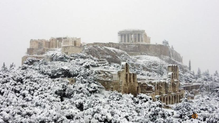 Acropolis covered by rare snow as cold snap hits Athens Acropolis covered by rare snow as cold snap hits Athens