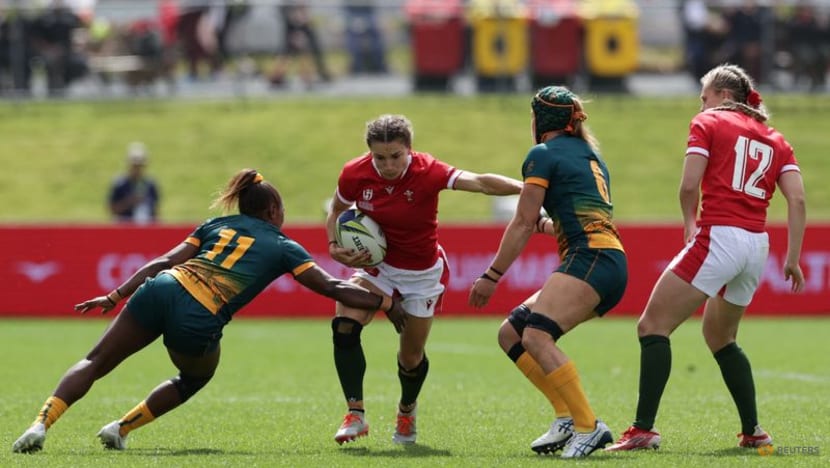 Rugby-Australia advance to quarters with narrow win over Wales, NZ thrash Scotland Rugby-Australia advance to quarters with narrow win over Wales, NZ thrash Scotland