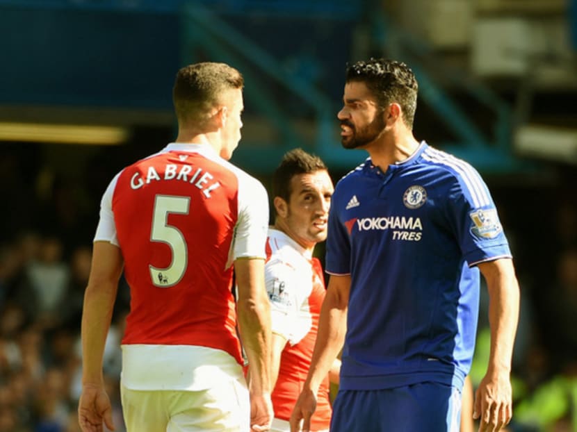 Diego Costa of Chelsea and Gabriel of Arsenal arguing during the match between Chelsea and Arsenal at Stamford Bridge on Sept 19, 2015. Photo: Getty Images