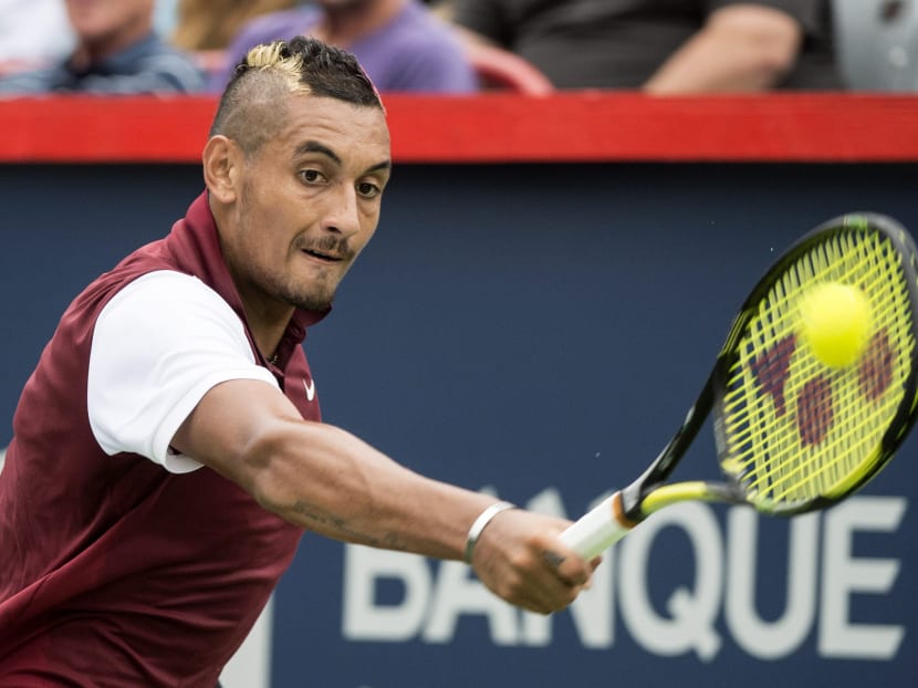 Nick Kyrgios, of Australia, returns to Fernando Verdasco, of Spain, at the Rogers Cup tennis tournament in Montreal, on Aug 11, 2015. Photo:The Canadian Press via AP