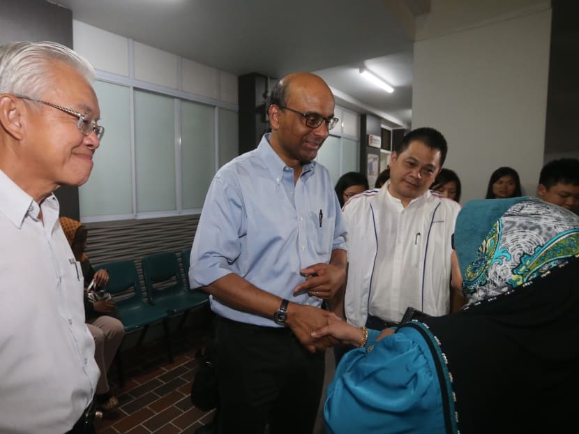 Deputy Prime Minister Tharman Shanmugaratnam (centre) after the first Meet-The-People session in Bukit Batok after the shock resignation of its ex-MP David Ong. Photo: Ooi Boon Keong
