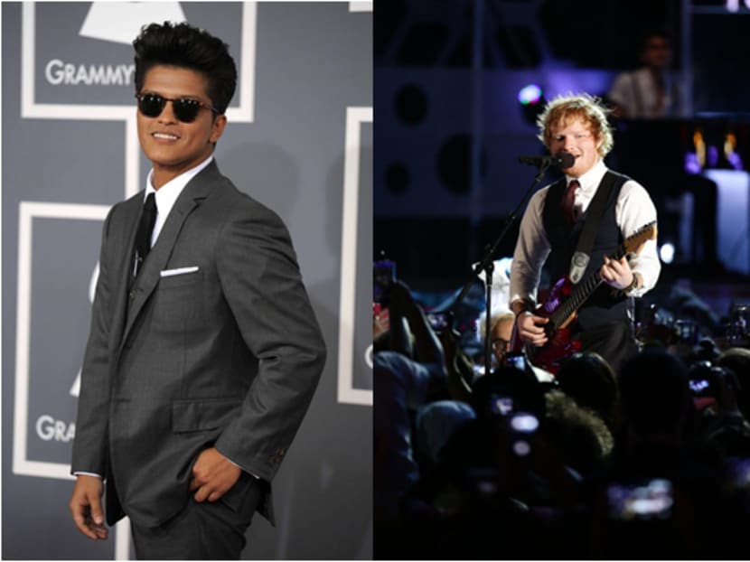 Bruno Mars and Ed Sheeran had a friendly twitter spat this afternoon. Photos: AP