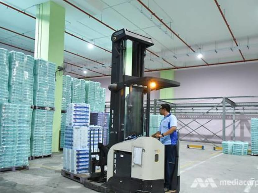 Paper products including toilet paper, kitchen towels and tissue paper stored in NTUC FairPrice's dry distribution centre.