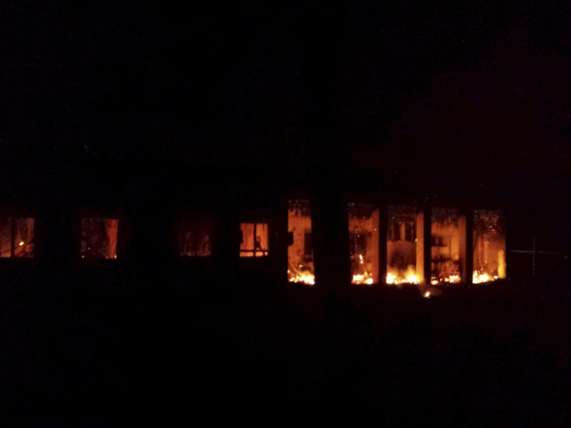 Fire is seen inside a Medecins Sans Frontieres (MSF) hospital building after an air strike in the city of Kunduz, Afghanistan in this October 3, 2015 photo. Photo: Medecins Sans Frontieres via Reuters