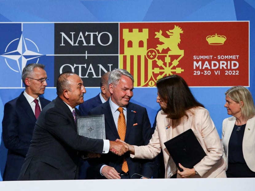 Turkish Foreign Minister Mevlut Cavusoglu shakes hands with Sweden's Foreign Minister Ann Linde after signing a document during the Nato summit in Madrid, Spain, on June 28, 2022. Turkish Foreign Minister Mevlut Cavusoglu shakes hands with Sweden's Foreign Minister Ann Linde after signing a document during the Nato summit in Madrid, Spain, on June 28, 2022.