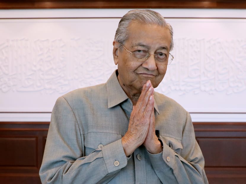 Malaysia's former Prime Minister Mahathir Mohamad gestures after an interview in Kuala Lumpur, Malaysia, on March 13, 2020.