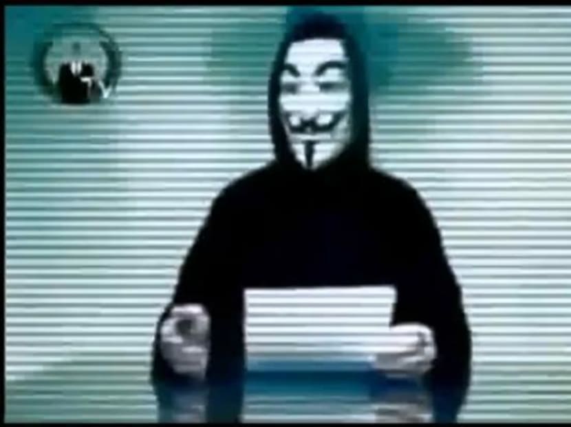 A screenshot of a video purportedly posted online by international hacker group Anonymous threatening to attack Singapore's infrastructure.