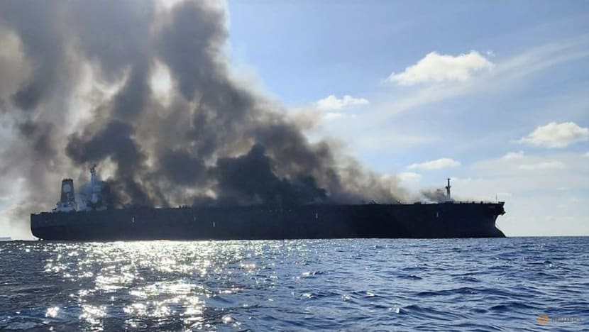 Three crew members missing after blaze on ageing tanker off Malaysia 