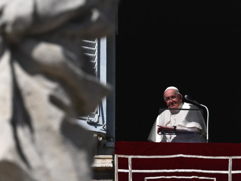 Pope Francis addresses the crowd during his Angelus prayer marking the All Saints' Day, from the window of the apostolic palace overlooking St. Peter's Square at the Vatican on Nov 1, 2022.
