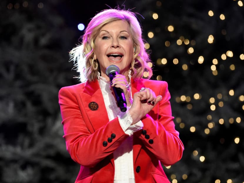 Olivia Newton-John performs before the 85th annual Hollywood Christmas Parade on November 27, 2016.