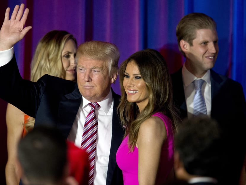 Republican presidential candidate Donald Trump and his wife Melania wave after a news conference at the Trump National Golf Club Westchester, NY, on Tuesday, June 7, 2016, Photo: AP