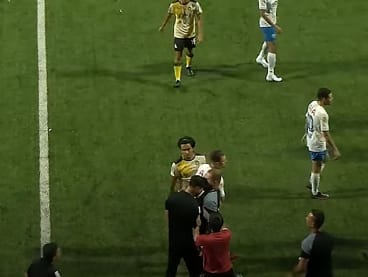 In the foreground, Lion City Sailors’ head coach Kim Do Hoon (left) and Tampines Rovers’ assistant coach Fahrudin Mustafic (right) are seen getting into a scuffle at Jalan Besar Stadium on July 24, 2022.