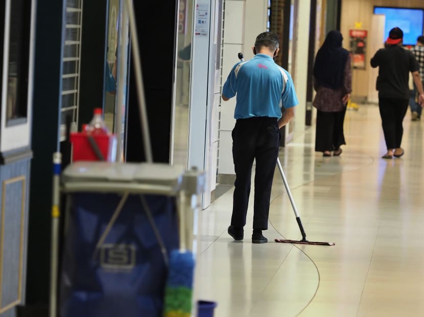 A cleaner mopping the floor of a mall in Bedok on June 9, 2020. During a debate on the Resilience Budget in April, Workers’ Party chief Pritam Singh called for a thorough review of what constitutes a living wage in Singapore.