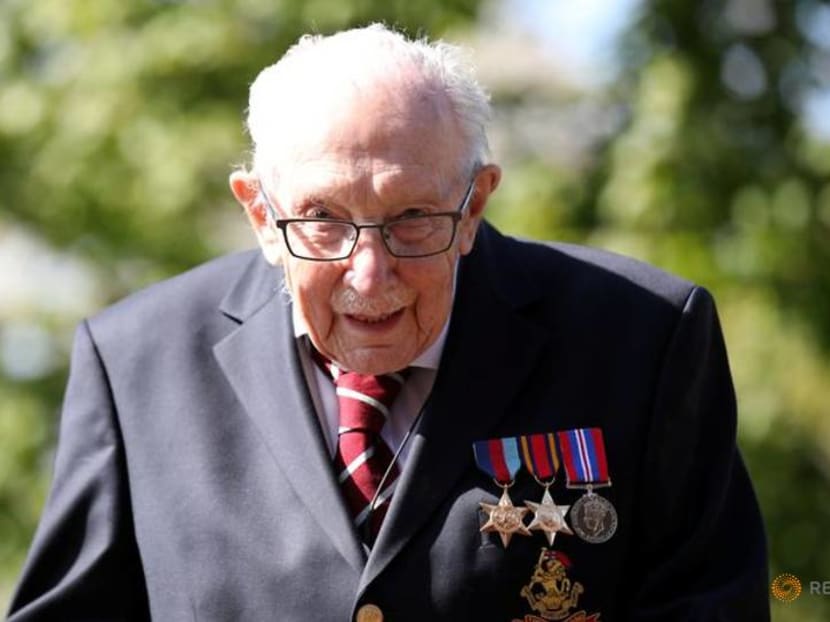 With tears and flowers, Britain mourns 'hero' Captain Tom Moore With tears and flowers, Britain mourns 'hero' Captain Tom Moore