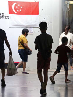 Singapore's total population back above pre-Covid levels, rising 5% to 5.92 million