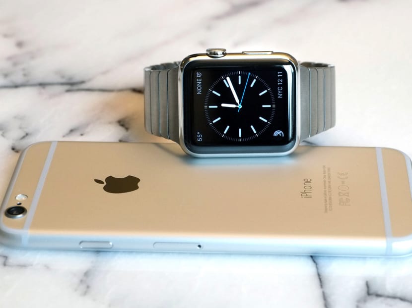 The Apple Watch can control music played from the iPhone. Photo: Bloomberg