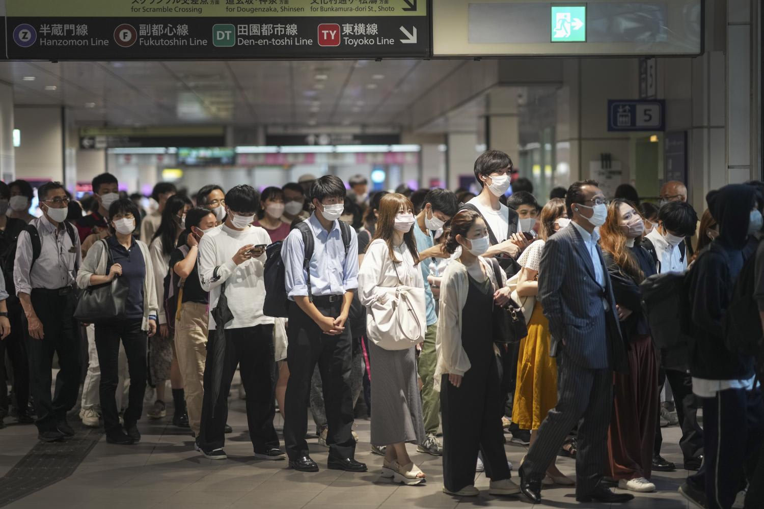 <p>A largely-masked crowd of commuters at the Shibuya Station in Tokyo on June 21, 2022. No Japanese government authority has ever mandated masks or vaccinations or instituted lockdowns. Instead, Japan’s residents have largely evaded the worst ravages of Covid-19 by letting peer pressure do a lot of the work. </p>
<p>A largely-masked crowd of commuters at the Shibuya Station in Tokyo on June 21, 2022. No Japanese government authority has ever mandated masks or vaccinations or instituted lockdowns. Instead, Japan’s residents have largely evaded the worst ravages of Covid-19 by letting peer pressure do a lot of the work. </p>