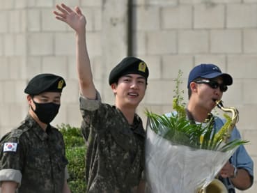 BTS star Jin finishes South Korean military service, greeted by bandmates