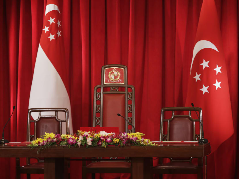 The Presidential Chair flanked by the State Flag and the Presidential Flag is seen at a swearing-in ceremony at the Istana on Oct 1, 2015. TODAY file photo