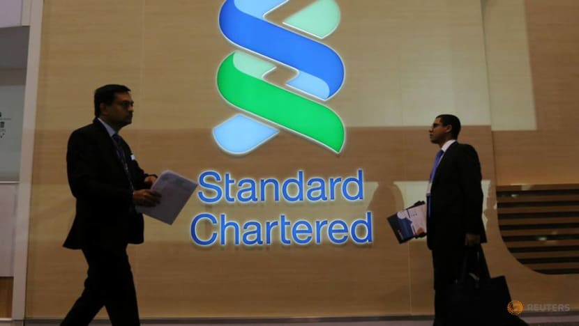Standard Chartered sets aside US$900 million to cover US, British fines