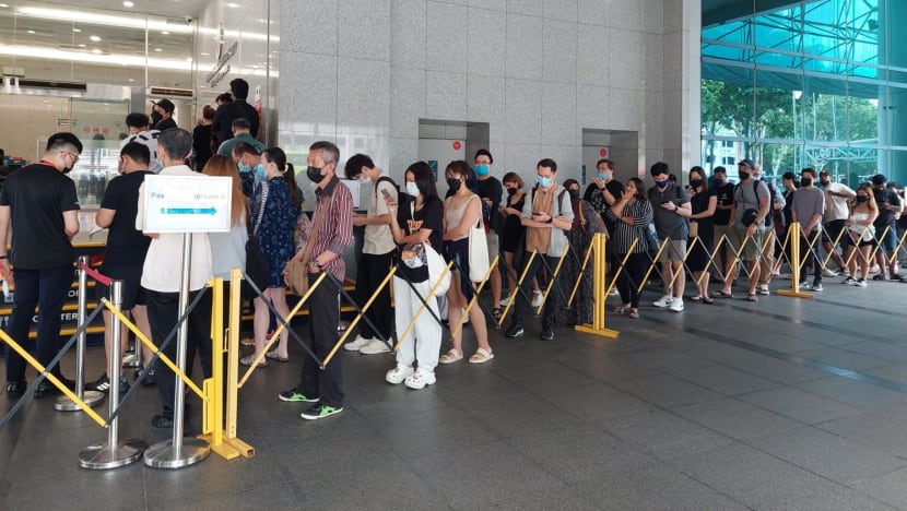 'I have a backache now': People wait for hours to collect passports at ICA building 