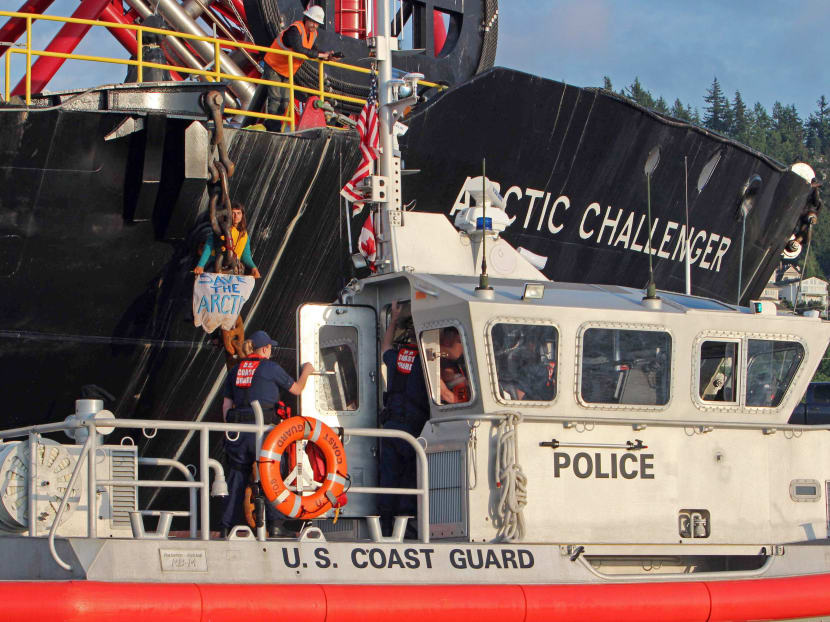 Gallery: 2 people chained to Shell ship north of Seattle