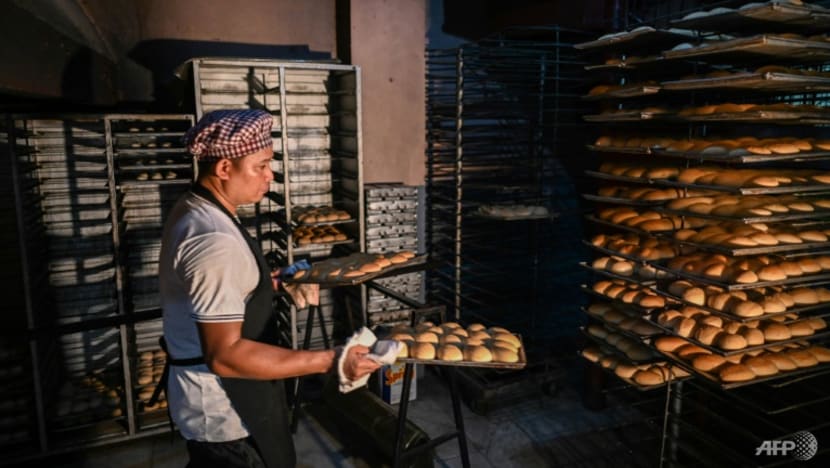 Philippine bakeries shrink 'poor man's bread' as inflation bites Philippine bakeries shrink 'poor man's bread' as inflation bites
