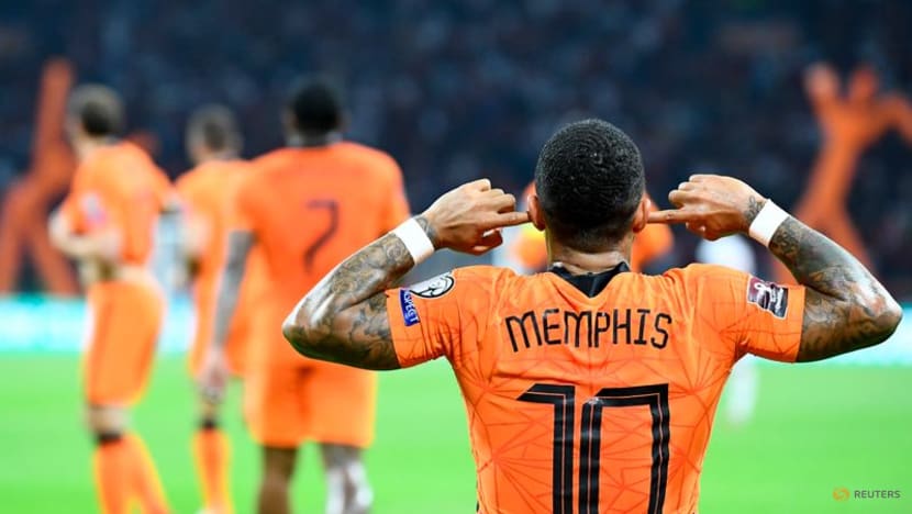 Football: Depay treble sends Dutch top of World Cup qualifying group Football: Depay treble sends Dutch top of World Cup qualifying group