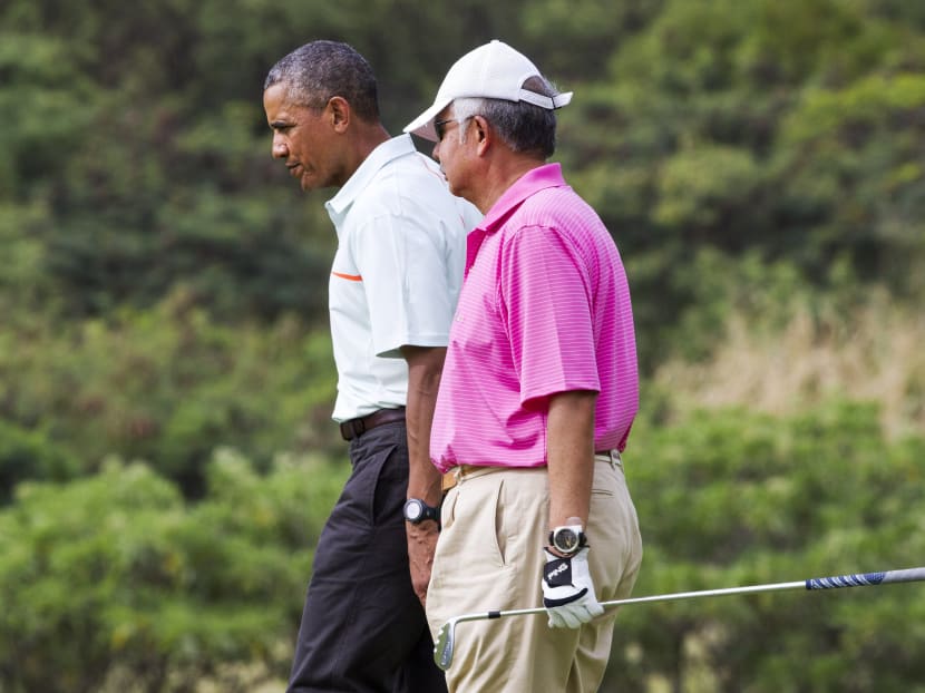 Malaysian Prime Minister Najib Razak, right, playing golf with US President Barack Obama in Hawaii on Dec 24. Photo: AP