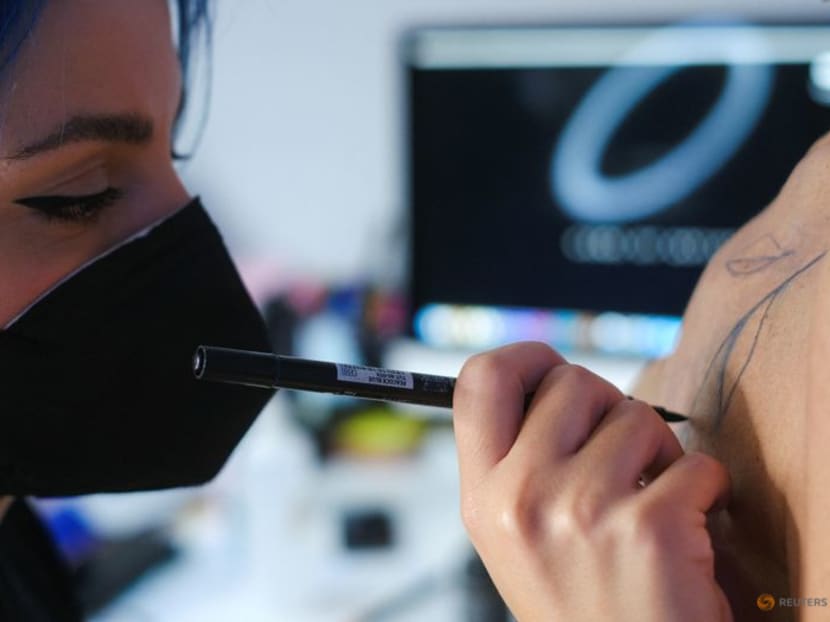 Lebanese tattoo artist helps breast cancer survivors to heal Lebanese tattoo artist helps breast cancer survivors to heal