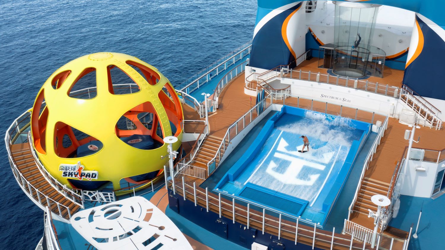 The Sky Pad bungee trampoline and FlowRider surf simulator are located at the stern of Royal Caribbean’s Spectrum of the Seas. Photos: Royal Caribbean The Sky Pad bungee trampoline and FlowRider surf simulator are located at the stern of Royal Caribbean’s Spectrum of the Seas. Photos: Royal Caribbean