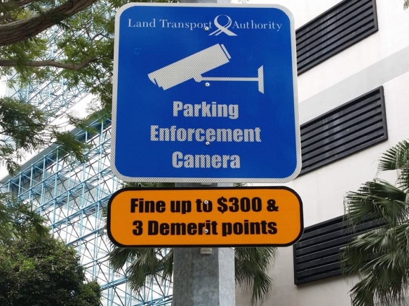 A CCTV camera and signage in a CCTV monitoring zone. Photo:LTA