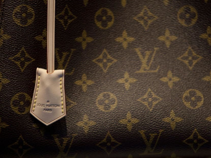 New York startup Entrupy says it has technology that can spot counterfeits without the guesswork. Its handheld microscope camera lets anyone with a smartphone check a luxury accessory within minutes. The company says its accuracy has improved to better than 98 per cent for 11 brands including Louis Vuitton, Chanel and Gucci. Photo: Bloomberg
